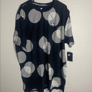 The black and white nike Tee